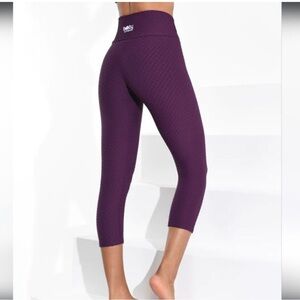 Booty By Brabants dark purple cropped leggings.